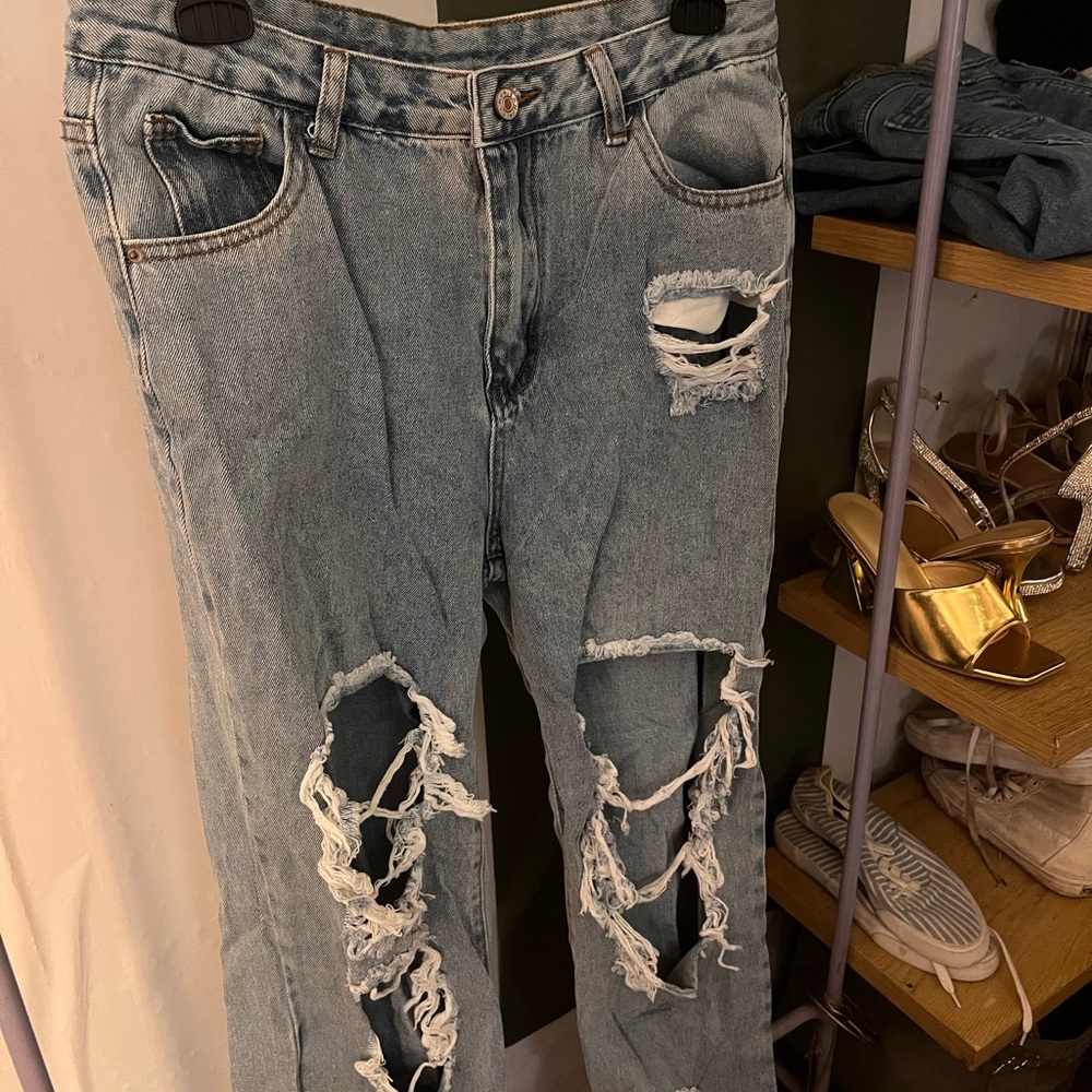 Distressed Blue Denim Jeans